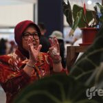 Menteri Sosial Tri Rismaharini menghadiri pameran tanaman hias FLOII. Foto: Stanly Pondaag